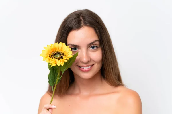 Young Caucasian Woman Isolated White Background Holding Sunflower While Smiling — Stock Photo, Image