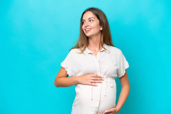 Young Caucasian Woman Isolated Blue Background Pregnant Happy — Fotografia de Stock