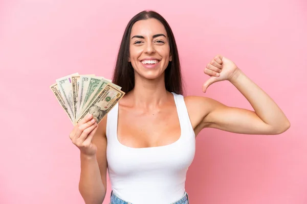 Young Caucasian Woman Taking Lot Money Isolated Pink Background Proud — Stock Photo, Image
