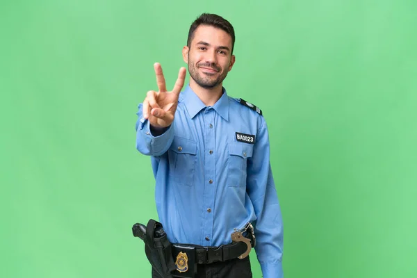 Молодий Поліцейський Білий Чоловік Над Ізольованим Тлом Посміхається Показує Знак — стокове фото