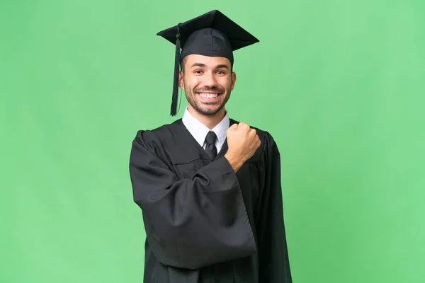 Young University Graduate Man Isolated Background Celebrating Victory — Stock Photo, Image