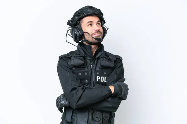 Young Caucasian Swat Man Isolated White Background Looking While Smiling — Stock Photo, Image
