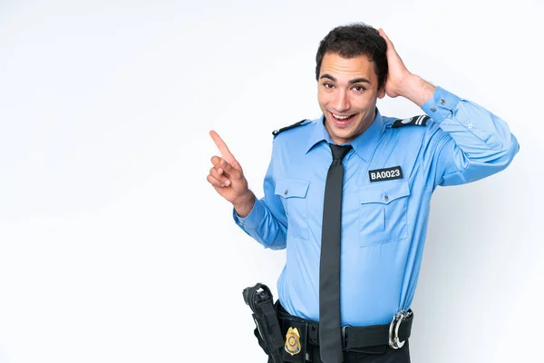 Jovem Polícia Caucasiano Homem Isolado Fundo Branco Surpreso Apontando Dedo — Fotografia de Stock