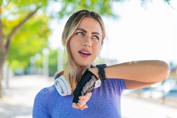 Young pretty sport woman with sport watch