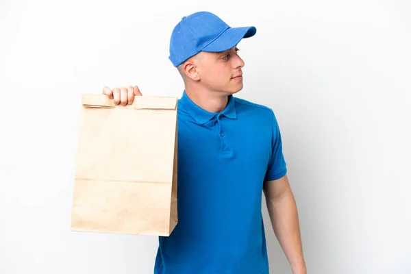 Young Brazilian Man Taking Bag Takeaway Food Isolated White Background — Stock Photo, Image
