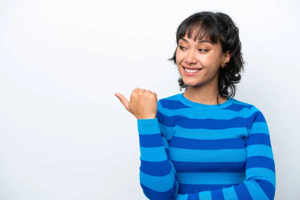 stock image Young Argentinian woman isolated on white background pointing to the side to present a product