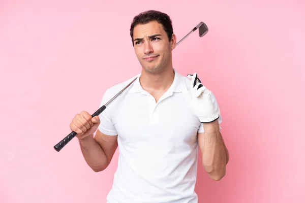 Young Golfer Player Man Isolated Pink Background Fingers Crossing Wishing — 图库照片