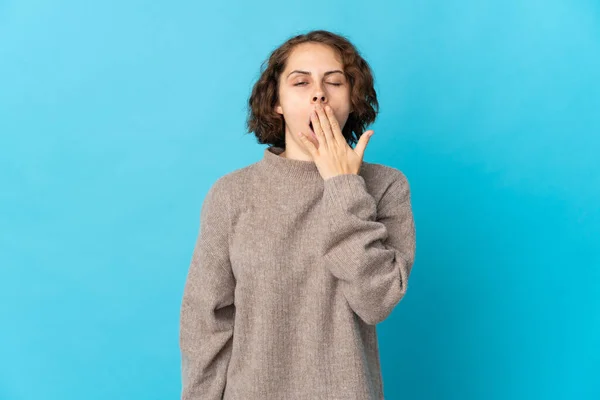Young English Woman Isolated Blue Background Yawning Covering Wide Open — Stok fotoğraf