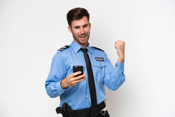 Jonge Politie Blanke Man Geïsoleerd Witte Achtergrond Met Telefoon Overwinningspositie — Stockfoto