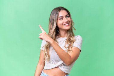 Genç Uruguaylı kadın tecrit edilmiş geçmişine şaşırmış ve işaret ediyor.