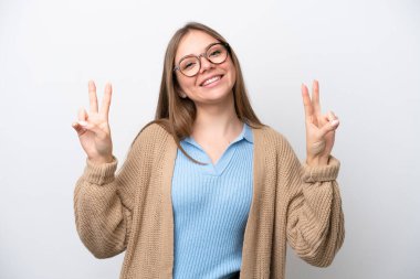 Young Lithuanian woman isolated on white background showing victory sign with both hands