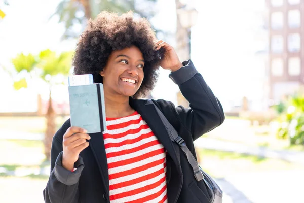 African American Girl Outdoors Holding Passport Surprised Expression — Stock Photo, Image