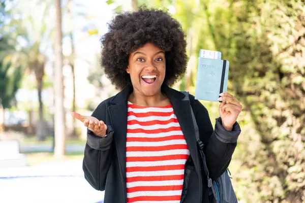 African American Girl Holding Passport Outdoors Shocked Facial Expression — Stock Photo, Image