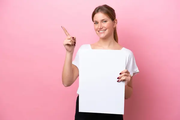 Young Caucasian Woman Isolated Pink Background Holding Empty Placard Pointing — Stock Photo, Image