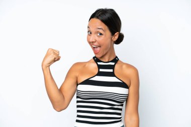 Young hispanic woman isolated on white background doing strong gesture