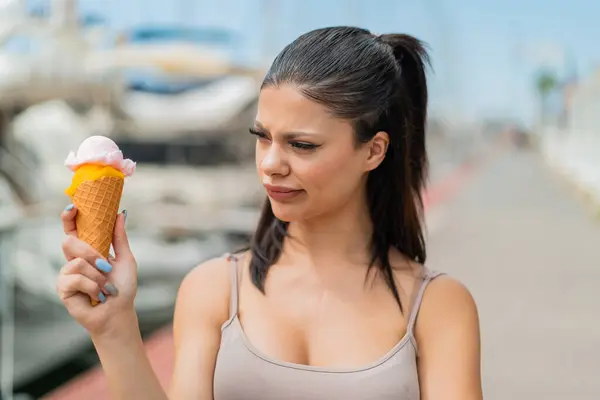 Young Pretty Woman Cornet Ice Cream Outdoors Sad Expression — Stock Photo, Image