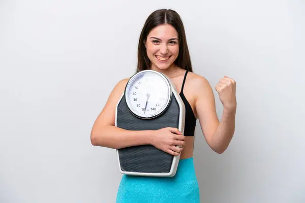 Young Girl Isolated White Background Weighing Machine Doing Victory Gesture — Stock Photo, Image