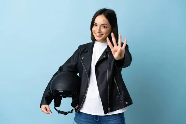 Mulher Segurando Capacete Motocicleta Isolado Fundo Azul Feliz Contando Quatro — Fotografia de Stock