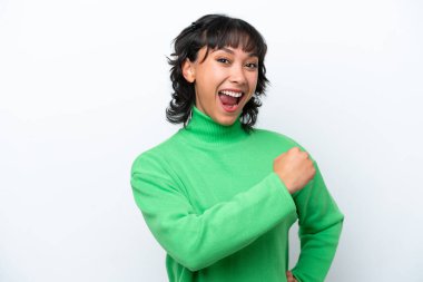 Young Argentinian woman isolated on white background celebrating a victory