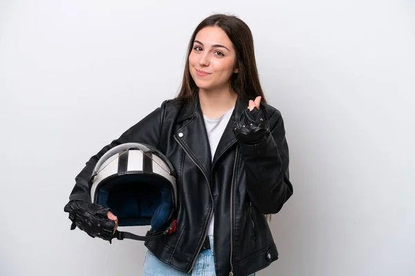 Молодая Девушка Мотоциклетном Шлеме Белом Фоне Зарабатывает Деньги Жест — стоковое фото