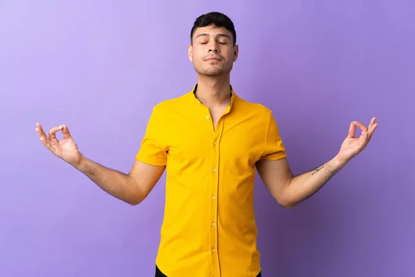 Young Colombian Man Isolated Purple Background Zen Pose — Stock Photo, Image