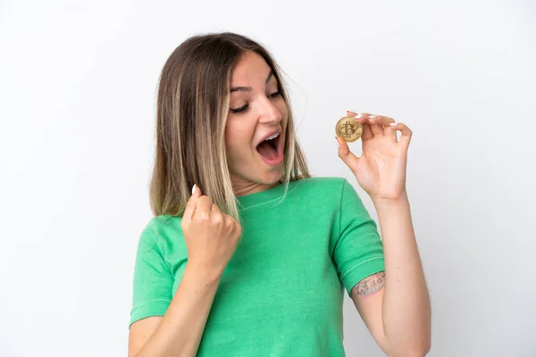Young Romanian Woman Holding Bitcoin Isolated White Background Celebrating Victory — Stock Photo, Image