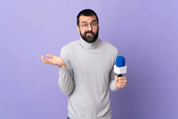Adult Reporter Man Beard Holding Microphone Isolated Purple Background Having — Stock Photo, Image