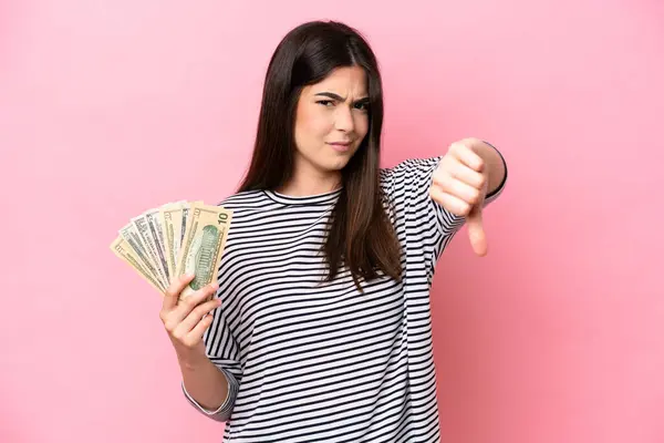 Young Brazilian Woman Taking Lot Money Isolated Pink Background Showing — Fotografia de Stock