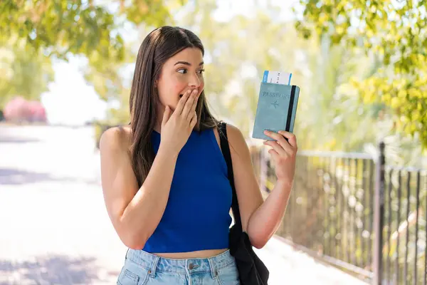 Young Pretty Brazilian Woman Holding Passport Outdoors Surprise Shocked Facial — Stock Photo, Image