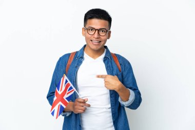 Young Ecuadorian woman holding an United Kingdom flag isolated on white background with surprise facial expression