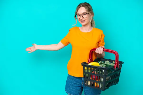 Blonde English Young Girl Holding Shopping Basket Full Food Isolated — Stock Photo, Image