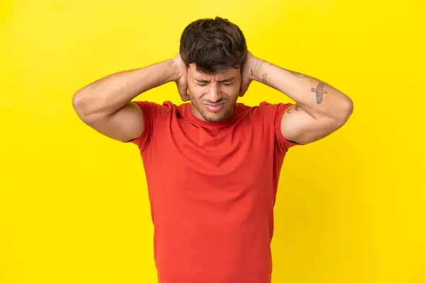 Young Caucasian Handsome Man Isolated Yellow Background Frustrated Covering Ears — Stock Photo, Image