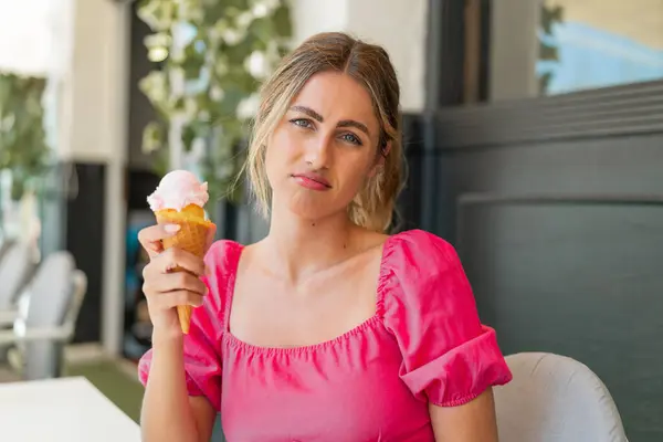 Young Blonde Woman Cornet Ice Cream Outdoors Sad Expression — Stock Photo, Image