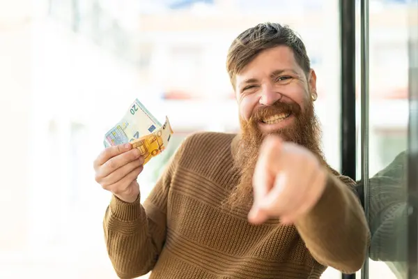 Redhead Man Beard Taking Lot Money Outdoors Points Finger You — Stock Photo, Image