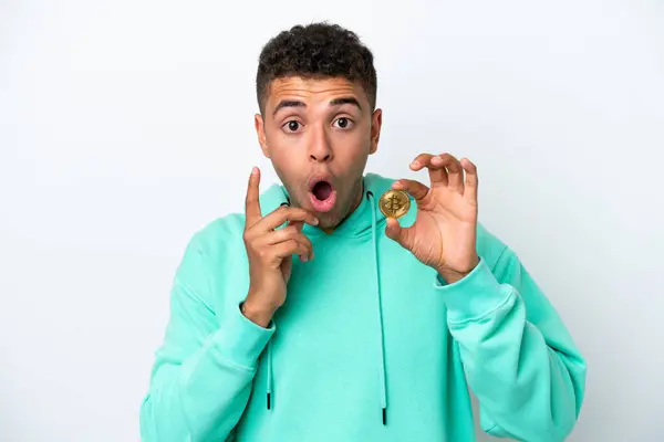 Young Brazilian Man Holding Bitcoin Isolated White Background Intending Realizes — Stock Photo, Image