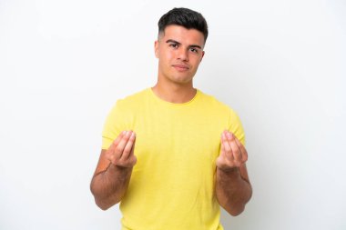 Beyaz arka planda izole genç beyaz yakışıklı adam para jesti yapıyor ama mahvoldu.
