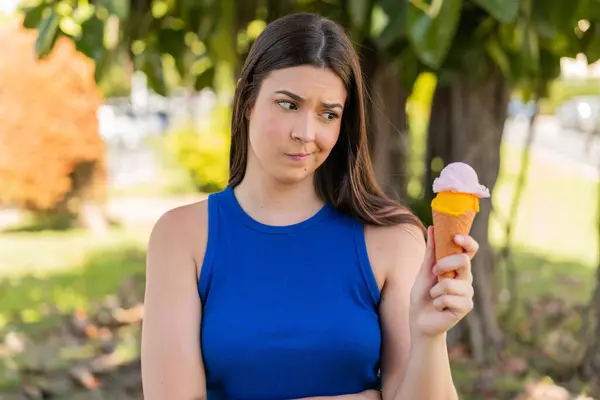 Young Pretty Brazilian Woman Cornet Ice Cream Outdoors Sad Expression — Stock Photo, Image