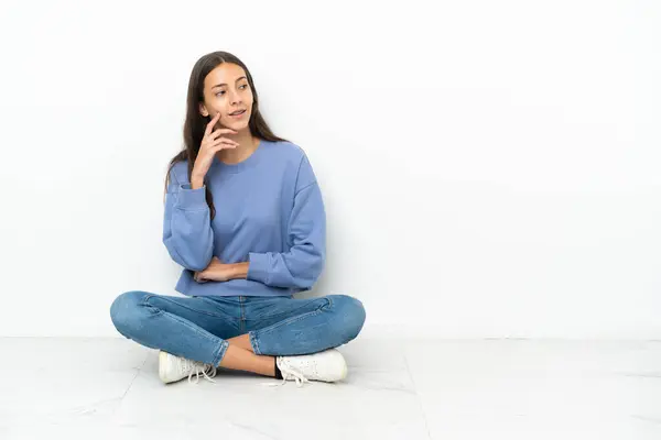 Young French Girl Sitting Floor Thinking Idea While Looking — Stock Photo, Image