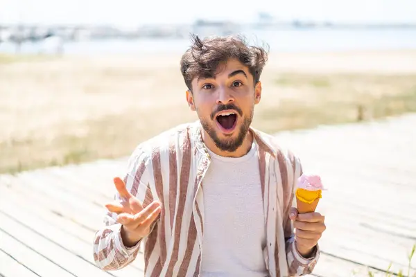 Handsome Arab Man Cornet Ice Cream Outdoors Shocked Facial Expression — Stock Photo, Image