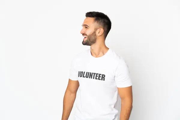 Young Caucasian Volunteer Man Isolated White Background Looking Side — Stock Photo, Image