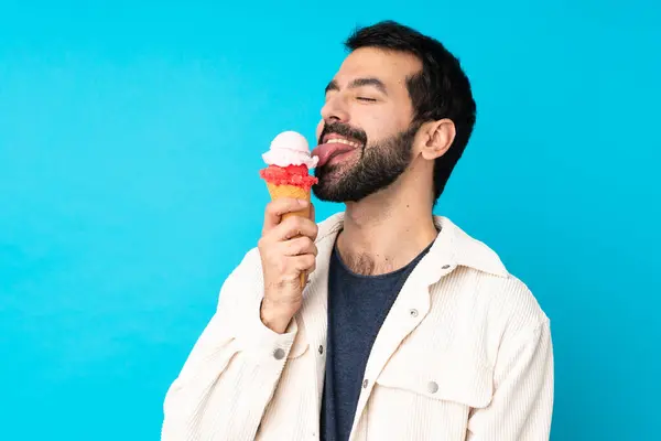 Young Man Cornet Ice Cream Isolated Blue Background — Stock Photo, Image
