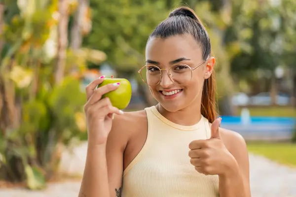 Young Pretty Woman Apple Outdoors Thumbs Because Something Good Has Royalty Free Stock Photos