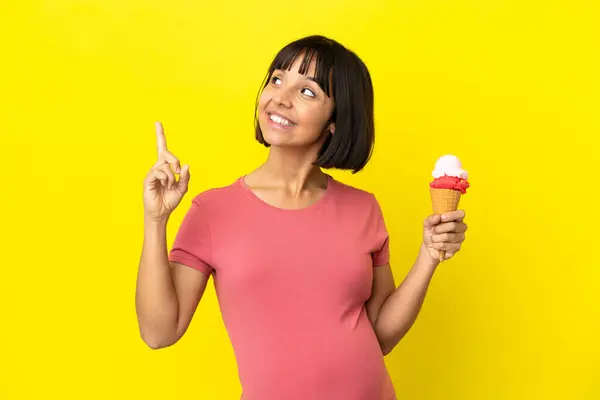 Pregnant Woman Holding Cornet Ice Cream Isolated Yellow Background Pointing — Stock Photo, Image