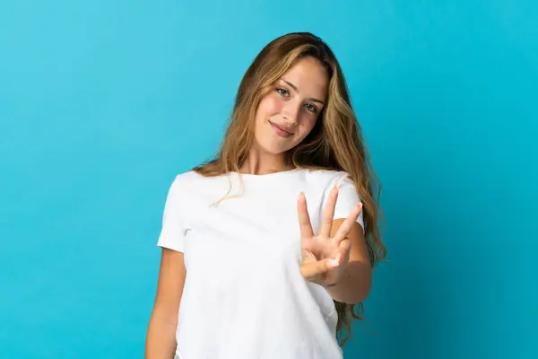 Mavi Arka Planda Izole Edilmiş Genç Sarışın Kadın Mutlu Parmaklarıyla Telifsiz Stok Fotoğraflar