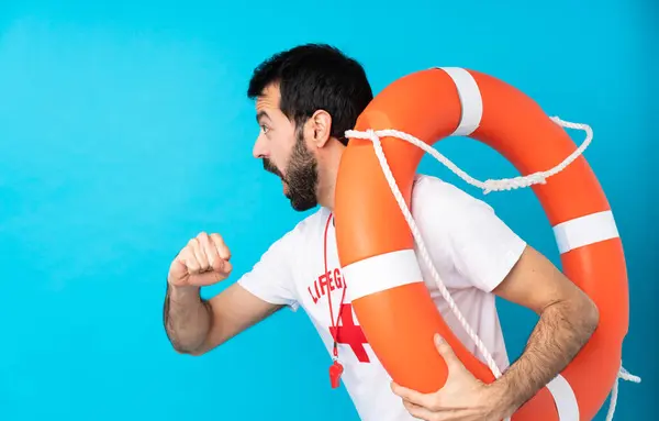 Lifeguard Man Isolated Blue Background Stock Picture