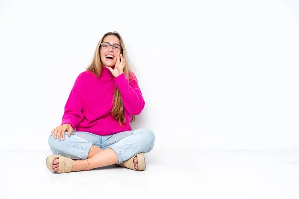 Young Caucasian Woman Sitting Floor Isolated White Background Shouting Mouth Stock Photo