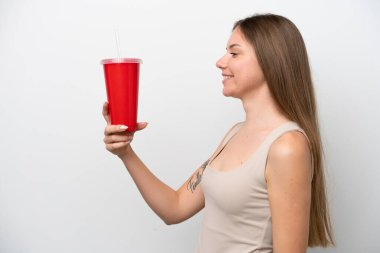 Young Lithuanian woman holding refreshment isolated on white background with happy expression