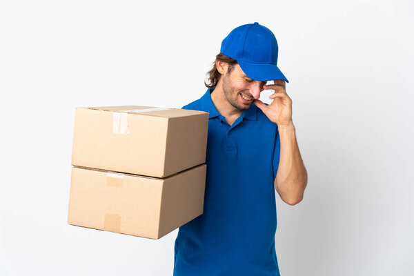 Delivery man isolated on white background laughing