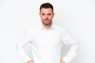 Young caucasian handsome man isolated on white background angry