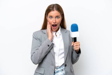 Young caucasian tv presenter woman isolated on white background with surprise and shocked facial expression